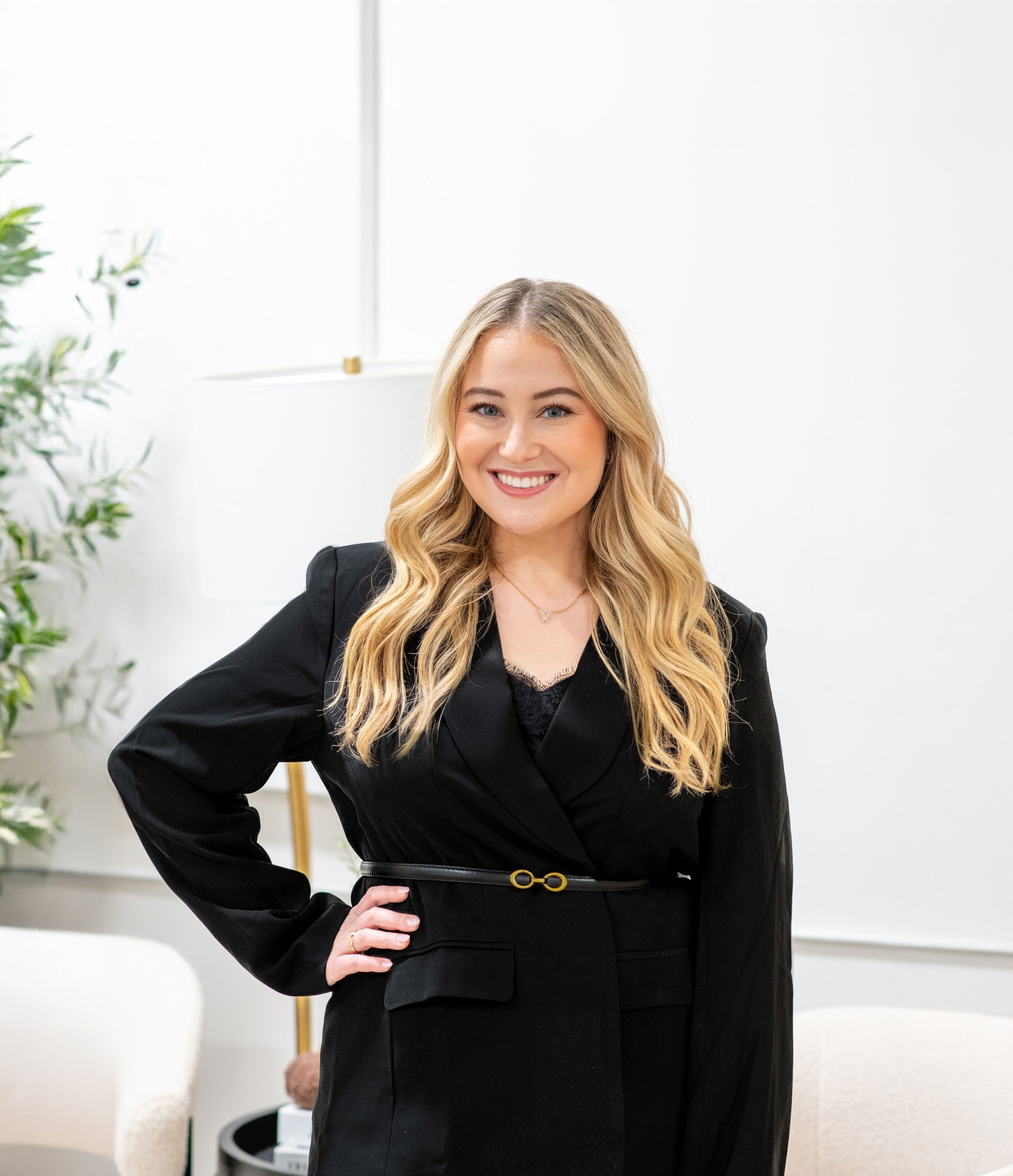 Sami Alpert of Beecham Bags wearing a black blazer and blue jeans in an indoor setting